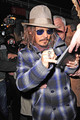 Johnny Depp signing autographs for fans - johnny-depp photo