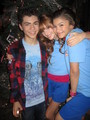 Bella,Zendaya,And Adam at the shake it up cast christmas party - bella-thorne photo