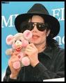 God MJ had the same teddy bear as me...:'( i still have it..<3 - michael-jackson photo