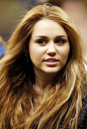  Miley at a New Orleans Saints Football Game on December 12,2010