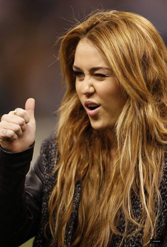  Miley at a New Orleans Saints Football Game on December 12,2010