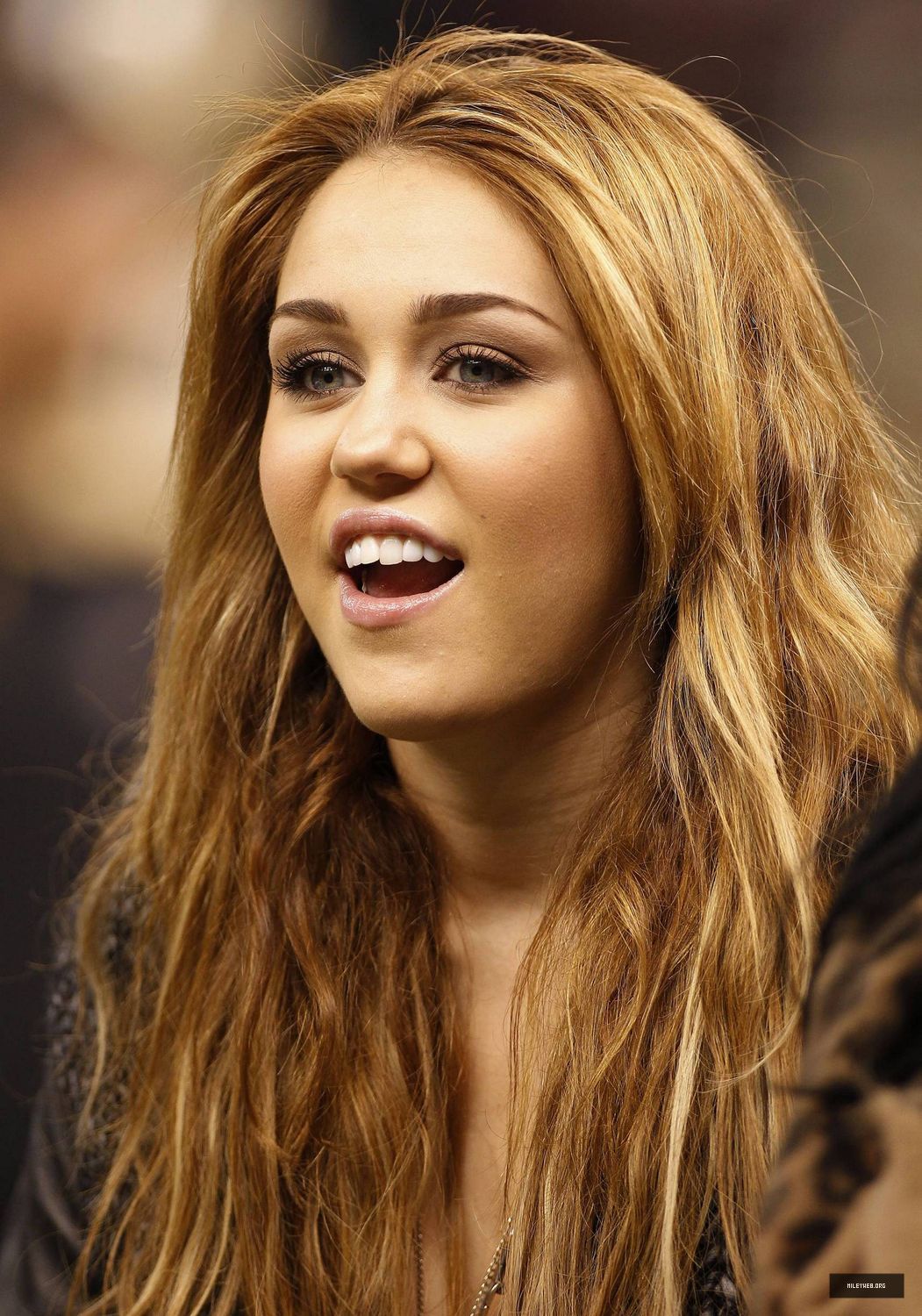 Miley at a New Orleans Saints Football Game on December 12,2010