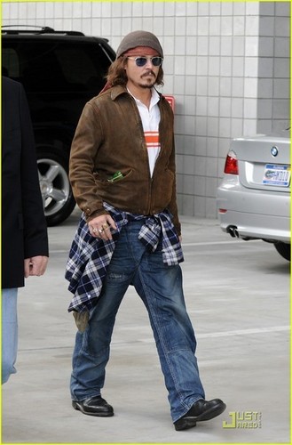  Johnny Depp in Miami & at a Football Game 19.12.2010