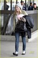 Dakota Fanning at LAX International Airport(January 2) - dakota-fanning photo