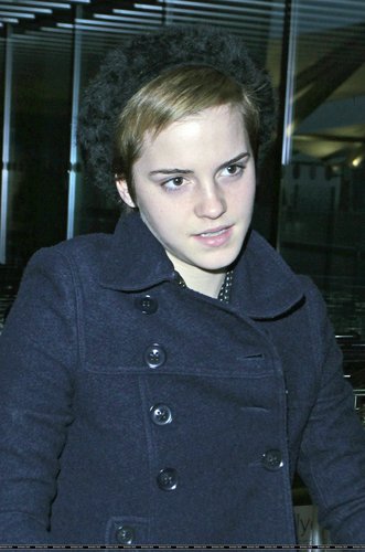 Emma Watson at Heathrow Airport On Friday (December 31st)