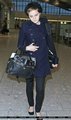 Emma Watson at Heathrow Airport On Friday (December 31st) - emma-watson photo