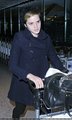Emma Watson at Heathrow Airport On Friday (December 31st) - harry-potter photo