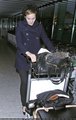 Emma Watson at Heathrow Airport On Friday (December 31st) - harry-potter photo