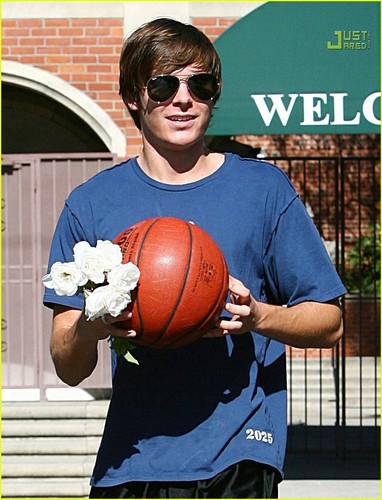 Zac Efron Showered With Flowers From Paparazzi