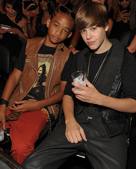 Justin Bieber and Jaden Smith wearing Louis Vuitton jean jackets, jeans,  ushanka-hats and “swag boots” in 2011.