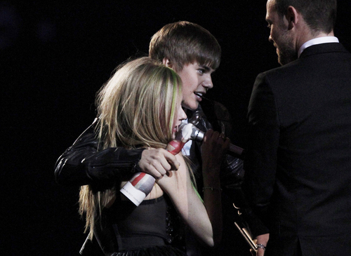 Justin with Avril at Brits Award 2011