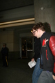 Rob arriving in Vancouver  02.21 - robert-pattinson photo
