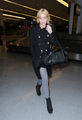 2011-03-13 - arrives at JFK airport - lindsay-lohan photo