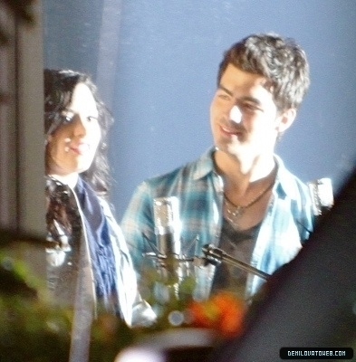 Demi and joe in make a wave on the sets.