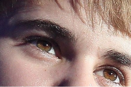  his sexy brown eyes not so brown :)) <3
