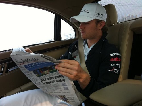 Nico Rosberg at car while relaxed and in way go to  GP China,Shanghai for the P3 and qualifying