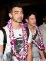 Nick & Joe Jonas Get Lei’d in Hawaii  April 21 2011 - the-jonas-brothers photo
