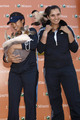 Na Li holding a kangaroo and Sania Mirza with a primate from Jungle Island - tennis photo