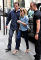 Reese Witherspoon is escorted from her car to the Hotel Plaza Athenee after a shopping trip to Carve - reese-witherspoon photo
