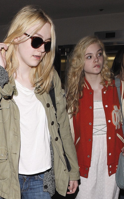 Dakota and Elle Fanning arriving at LAX Airport May 3 