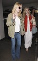 Dakota and Elle Fanning arriving at LAX Airport (May 3). - dakota-fanning photo