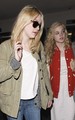 Dakota and Elle Fanning arriving at LAX Airport (May 3). - dakota-fanning photo