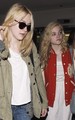 Dakota and Elle Fanning arriving at LAX Airport (May 3). - elle-fanning photo