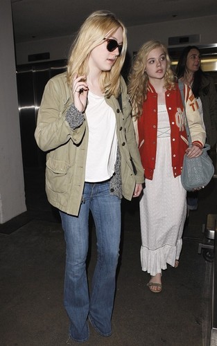  Dakota and Elle Fanning arriving at LAX Airport (May 3).