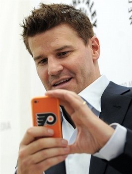  Db taking fotografias of the crowd at Paley
