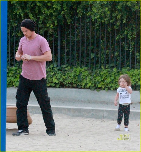 Cam with his daughter on playground in LA