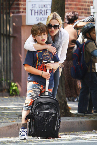 Kate Winslet picks up her son