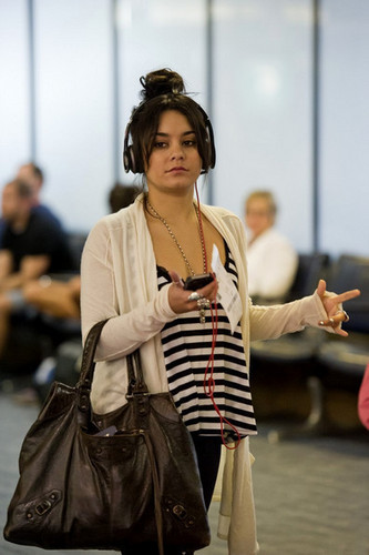  Vanessa Hudgens prepares to depart from LAX Airport