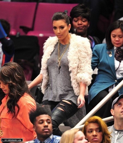  Kim attends the Milwaukee Bucks vs New York Knicks bola keranjang game 3/25/11