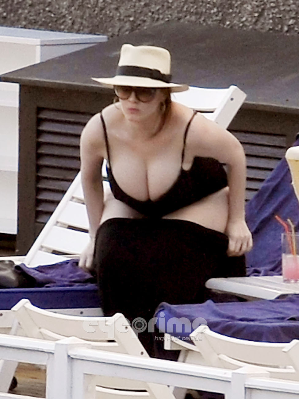 Christina Hendricks relaxing by the Hotel Pool in Lake Como,