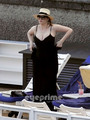 Christina Hendricks relaxing by the Hotel Pool in Lake Como, Italy. - christina-hendricks photo