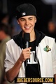 Justin Bieber Recieving his Award for CMT Music Awards - justin-bieber photo