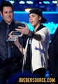 Justin Bieber Recieving his Award for CMT Music Awards - justin-bieber photo