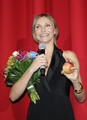 Cameron Diaz signs 'I Love Berlin' upon her arrivat at the 'Bad Teacher' Germany Premiere  - cameron-diaz photo