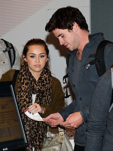  Miley - At Sydney Airport with Liam in Australia - June 20, 2011