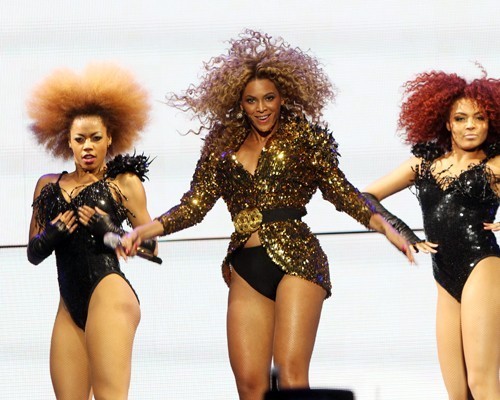  beyonce performing at the 2011 Glastonbury Festival (June 26).