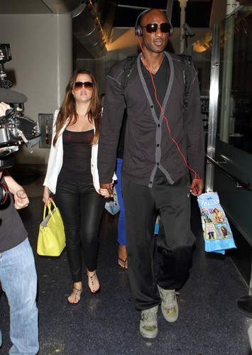 Khloe Kardashian And Lamar Odom Arriving On A Flight At LAX