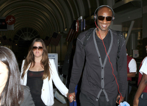 Khloe Kardashian And Lamar Odom Arriving On A Flight At LAX
