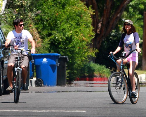 Victoria Justice riding her bike with her boyfriend actor Ryan Rottman