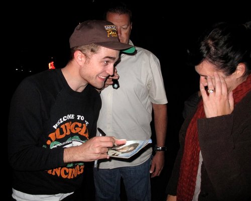 rob with fans in set cosmopolis