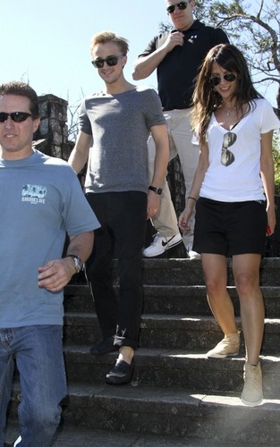 Tom Felton and girlfriend Jade Olivia strolling at the beach in Rio de Janeiro, Brazil (July 16).