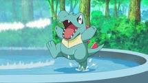 Totodile dancing in a fountain