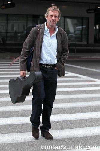  Hugh Laurie- arrives at LAX airport on a flight from London. Los Angeles, California - 20.07.11
