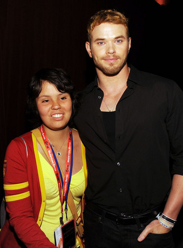 Kellan Lutz poses with fans at the Summit Entertainment Comic-Con Party at the Hard Rock Hotel 