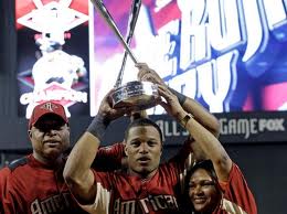  Cano holding Trophy