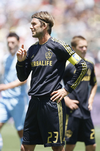 David warms up before LA Galaxy take on England's Manchester City